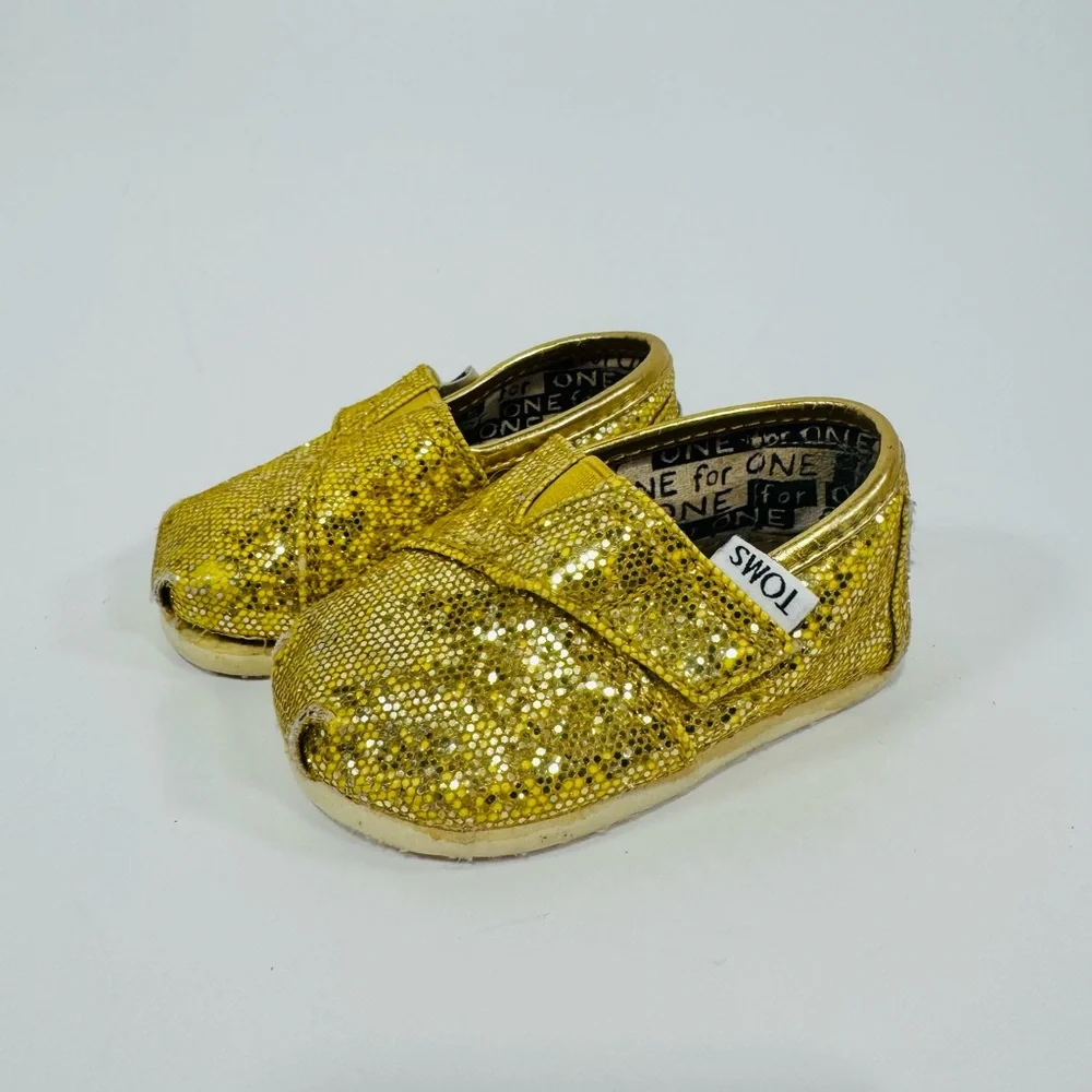 TOMS 2T Yellow Gold Sparkly Toddler Shoes with Velcro Strap.